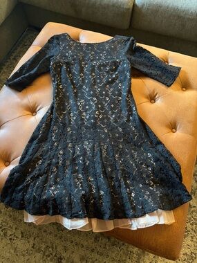 Betsey Johnson size 6 black lace dress
Fit and flare style
